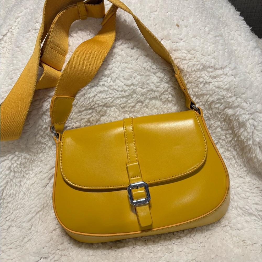 Madison West Yellow Crossbody Bag with Sleek Design and Flap Closure